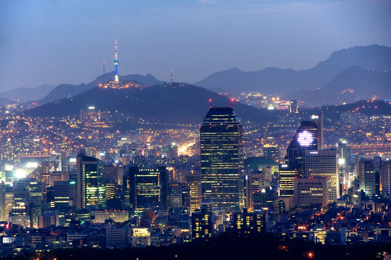 Seoul city skyline with N Seoul Tower at dusk, South Korea.