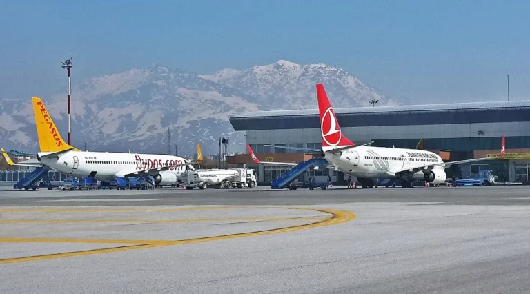 Van Ferit Melen Airport terminal and aircraft with Mount Erek in the background.